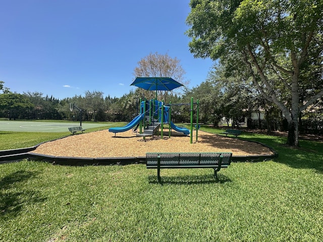 473 Cottagewood Ln, West Palm Beach, FL 33411 - community play area with a lawn