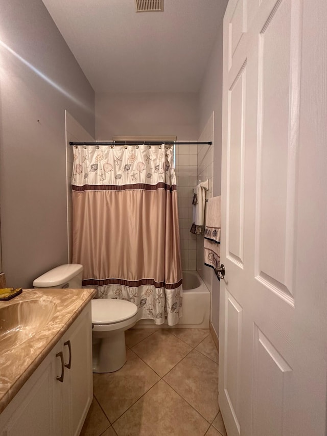 473 Cottagewood Ln, West Palm Beach, FL 33411 - bathroom featuring vanity, toilet, shower / bath combo with shower curtain, and tile patterned floors