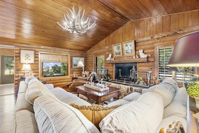 32801 US Highway 441 N Unit 64, Okeechobee, FL 34972 - living room with hardwood / wood-style floors, wood ceiling, a chandelier, lofted ceiling, and rustic walls
