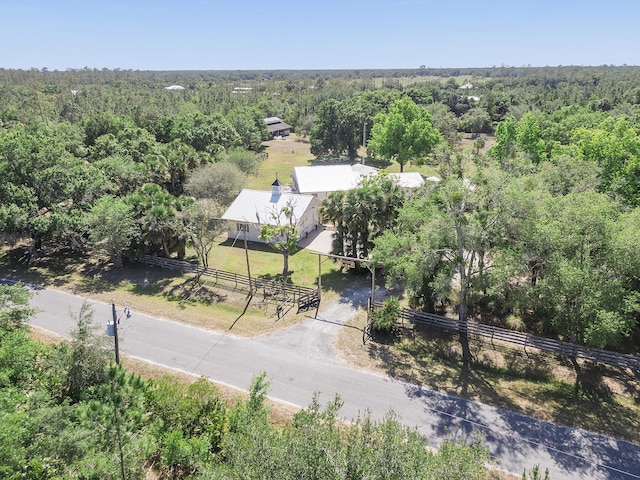 32801 US Highway 441 N Unit 64, Okeechobee, FL 34972 - aerial view of sparsely populated area with a heavily wooded area