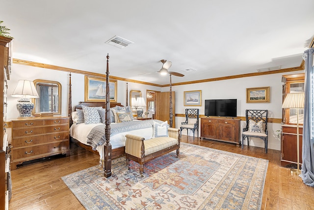 32801 US Highway 441 N Unit 64, Okeechobee, FL 34972 - bedroom with crown molding, light wood finished floors, and baseboards