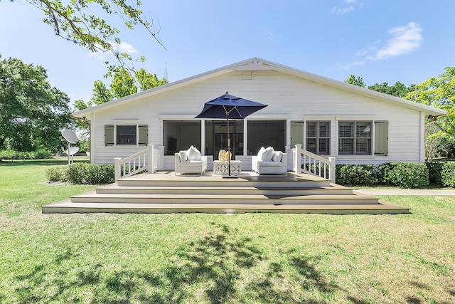 32801 US Highway 441 N Unit 64, Okeechobee, FL 34972 - rear view of house with a deck, a lawn, and an outdoor living space
