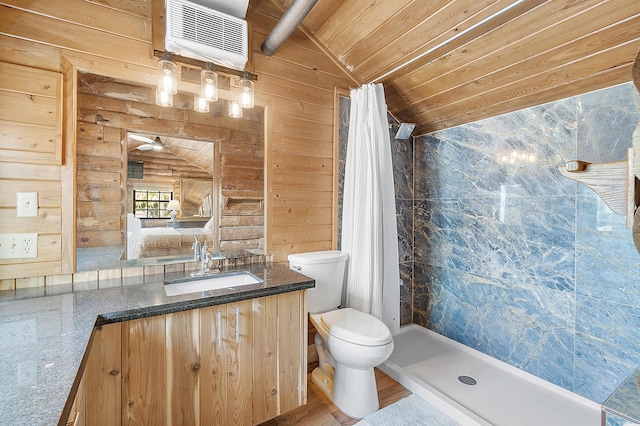 32801 US Highway 441 N Unit 64, Okeechobee, FL 34972 - full bath featuring toilet, a shower stall, wood walls, vaulted ceiling, and vanity