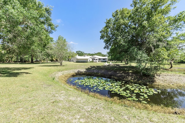 32801 US Highway 441 N Unit 64, Okeechobee, FL 34972 - view of grassy yard with a water view