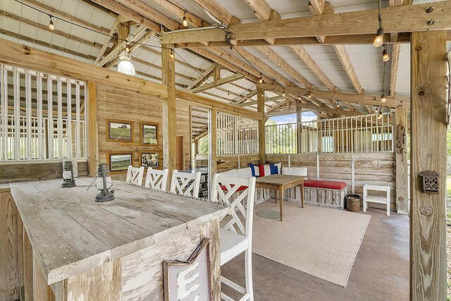 32801 US Highway 441 N Unit 64, Okeechobee, FL 34972 - unfurnished sunroom with vaulted ceiling