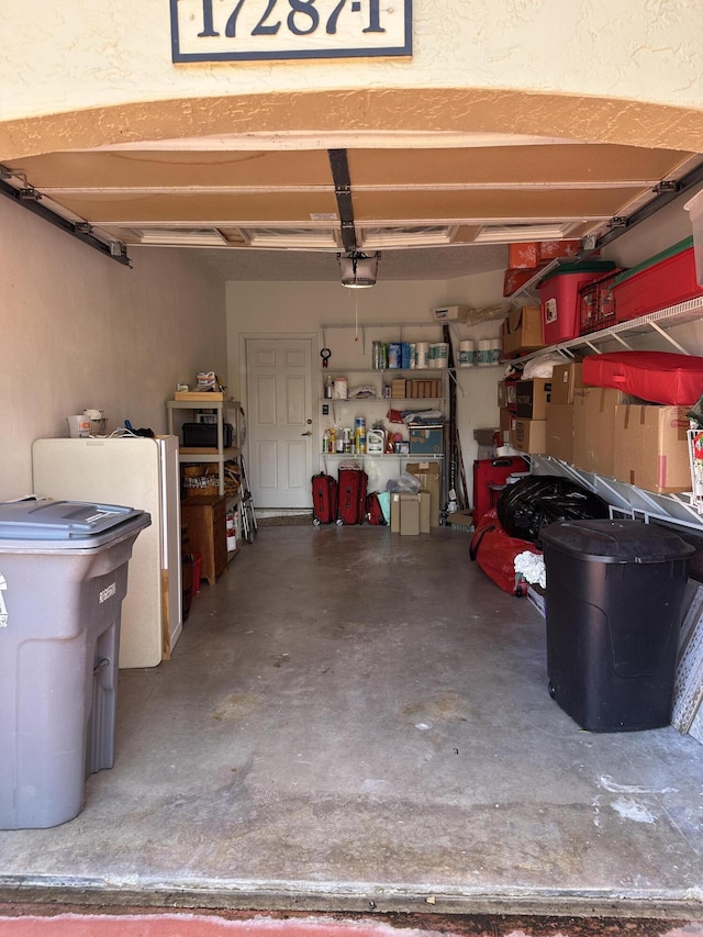 17287 Boca Club 1 Blvd Unit 1, Boca Raton, FL 33487 - garage with a garage door opener