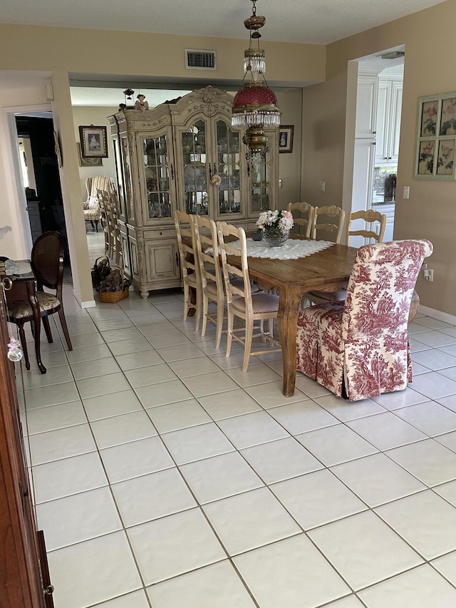 17287 Boca Club 1 Blvd Unit 1, Boca Raton, FL 33487 - dining space featuring light tile patterned flooring
