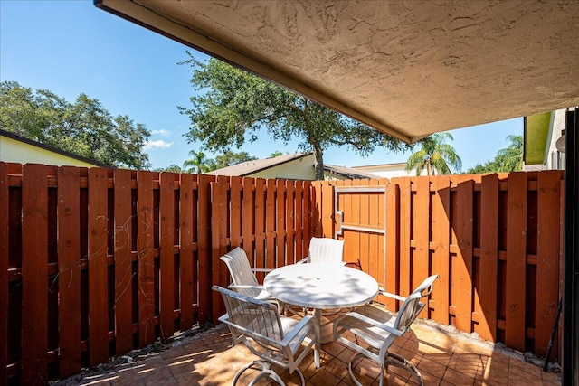 view of patio / terrace with fence and outdoor dining space