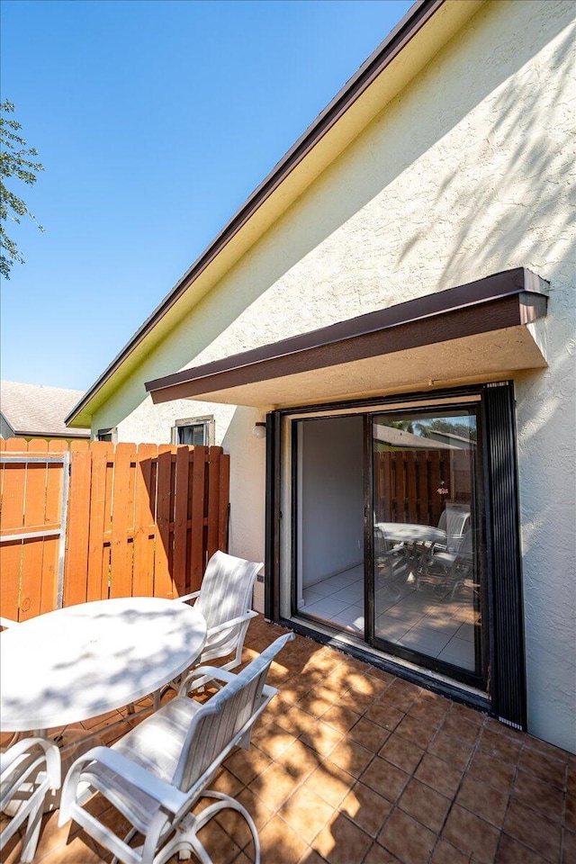 view of patio / terrace with fence and outdoor dining space