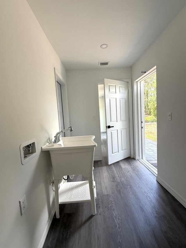 382 Mcarthur Blvd, Lehigh Acres, FL 33974 - bathroom with baseboards and wood finished floors