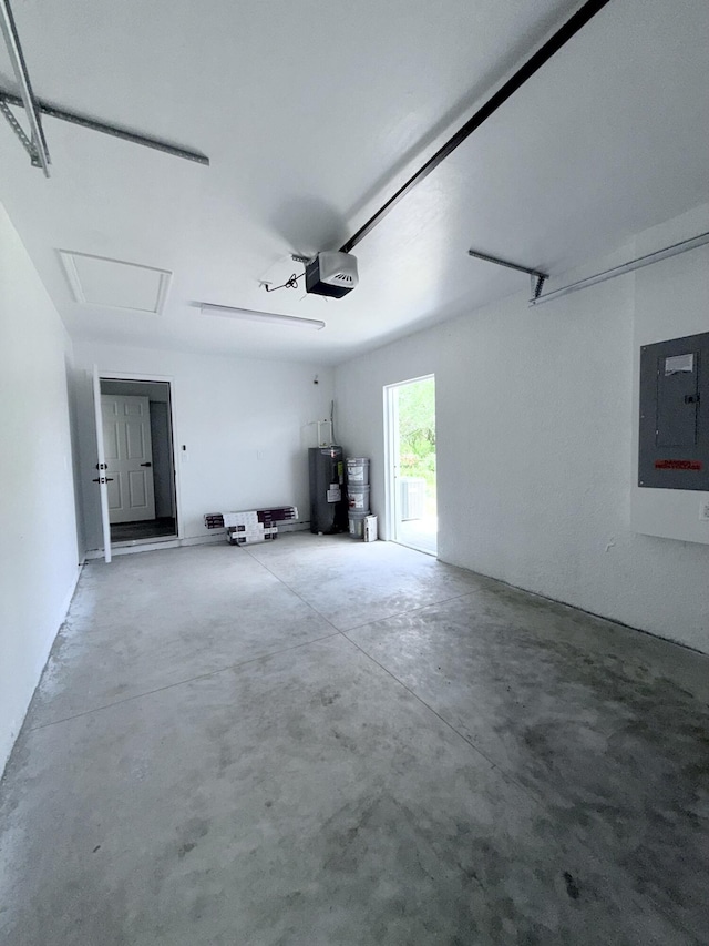 382 Mcarthur Blvd, Lehigh Acres, FL 33974 - garage with electric panel, water heater, and a garage door opener