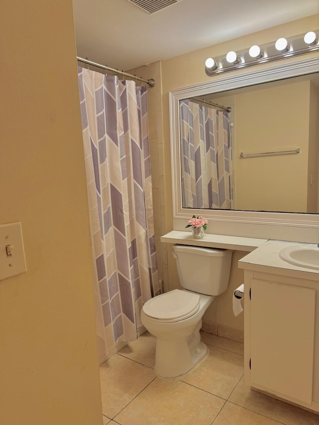 full bath with tile patterned flooring, toilet, vanity, and a shower with shower curtain