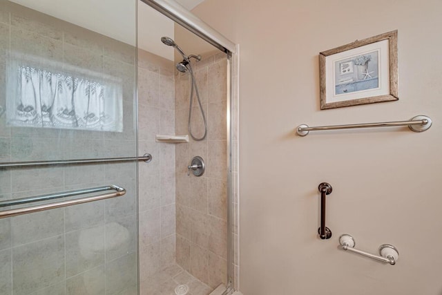 bathroom featuring a stall shower
