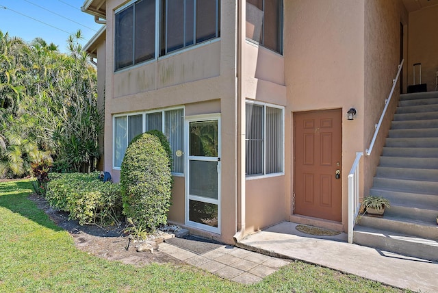 12416 Alternate A1A P7, Palm Beach Gardens, FL 33410 - property entrance featuring stucco siding