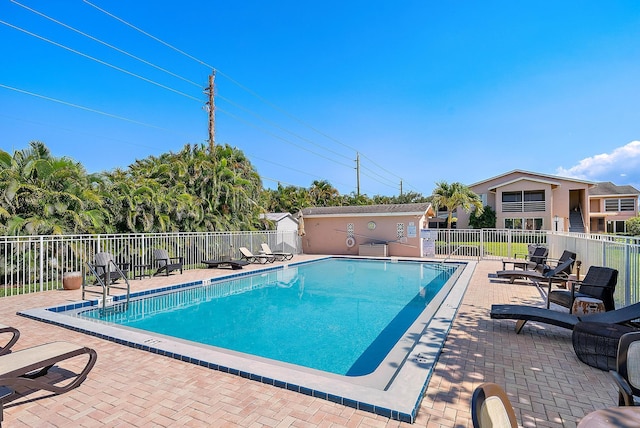 12416 Alternate A1A P7, Palm Beach Gardens, FL 33410 - community pool with fence and a patio