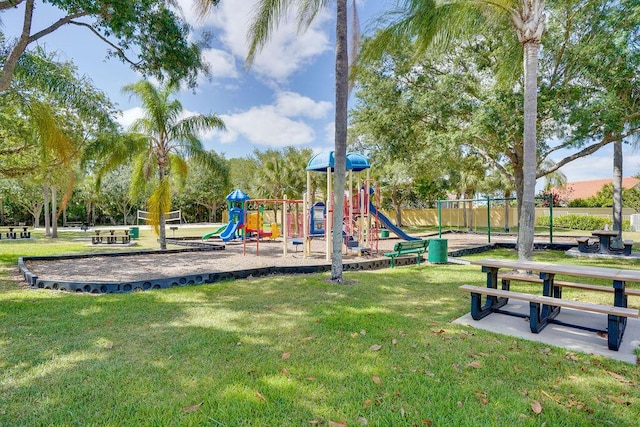 138 NW Magnolia Lakes Blvd, Port Saint Lucie, FL 34986 - community playground with a yard