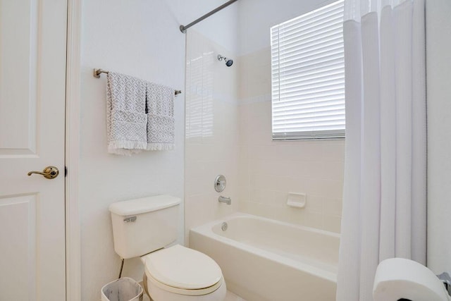 138 NW Magnolia Lakes Blvd, Port Saint Lucie, FL 34986 - bathroom with toilet and shower / bath combo with shower curtain