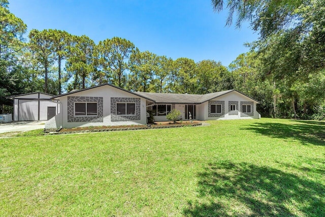 4901 129th Ave N, The Acreage, FL 33411 - ranch-style house with a front lawn, stucco siding, and concrete driveway