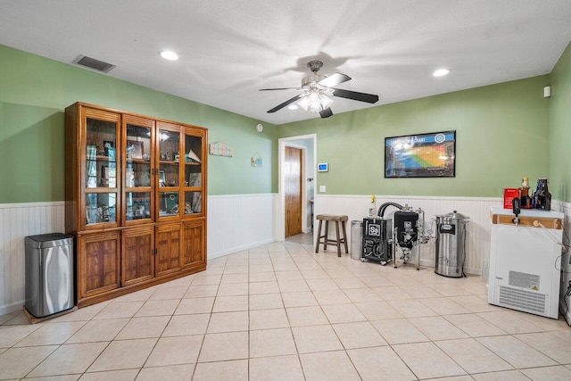 4901 129th Ave N, The Acreage, FL 33411 - interior space featuring wainscoting, ceiling fan, recessed lighting, and light tile patterned floors