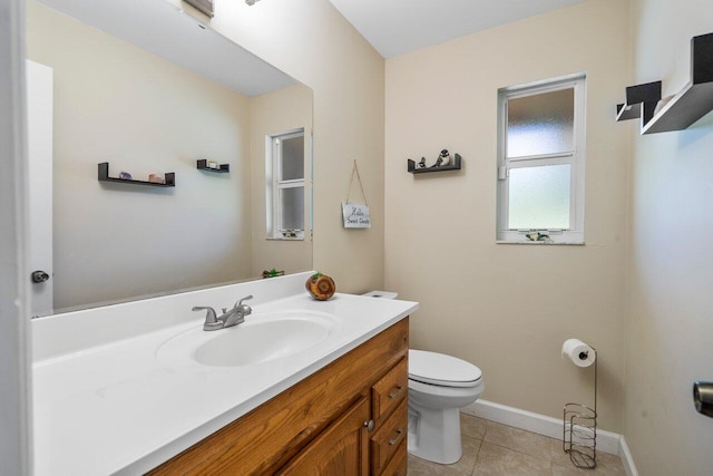 4901 129th Ave N, The Acreage, FL 33411 - half bath with toilet, tile patterned flooring, vanity, and baseboards