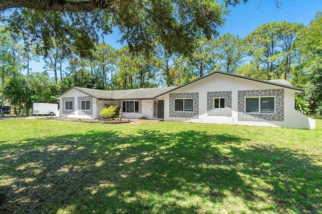 4901 129th Ave N, The Acreage, FL 33411 - view of front of property featuring stucco siding and a front yard