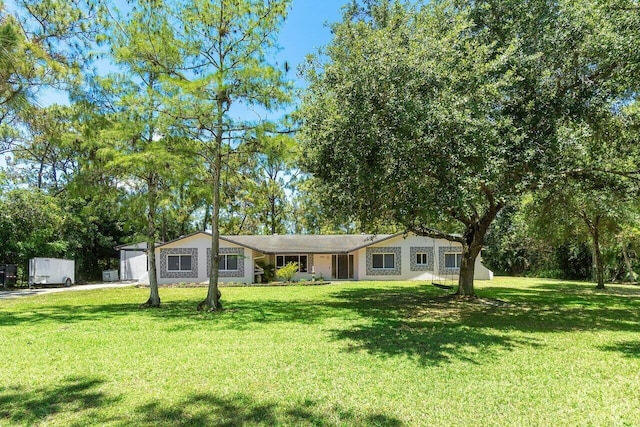 4901 129th Ave N, The Acreage, FL 33411 - single story home featuring a front yard
