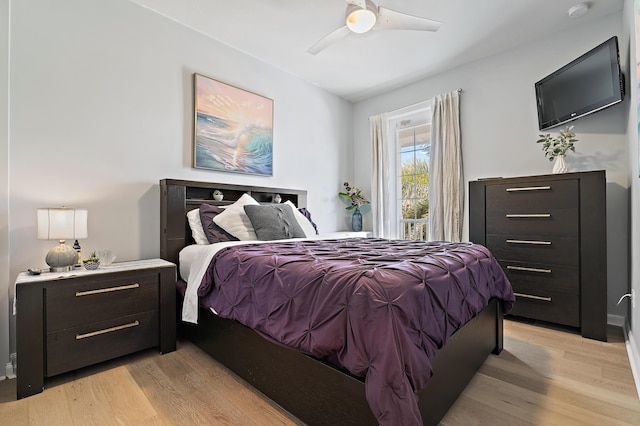 1310 S Jeaga Dr, Jupiter, FL 33458 - bedroom featuring light wood-type flooring and a ceiling fan