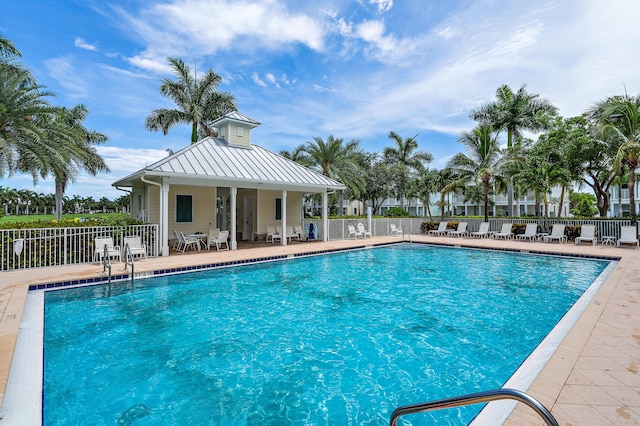 1310 S Jeaga Dr, Jupiter, FL 33458 - community pool featuring a patio area