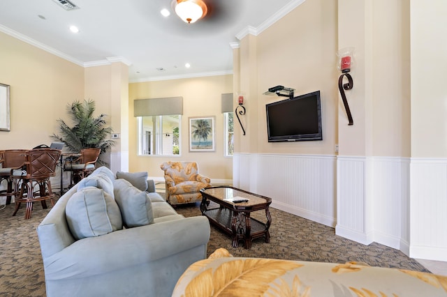 1310 S Jeaga Dr, Jupiter, FL 33458 - living room with ornamental molding, carpet floors, recessed lighting, and a wainscoted wall