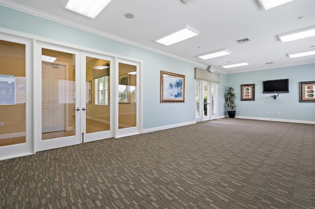 1310 S Jeaga Dr, Jupiter, FL 33458 - carpeted empty room featuring french doors, ornamental molding, and baseboards