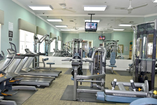 1310 S Jeaga Dr, Jupiter, FL 33458 - gym featuring ornamental molding and a ceiling fan