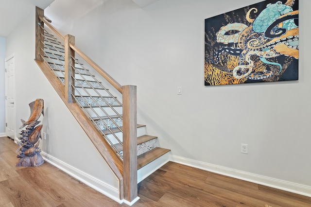 1310 S Jeaga Dr, Jupiter, FL 33458 - staircase with baseboards and wood finished floors