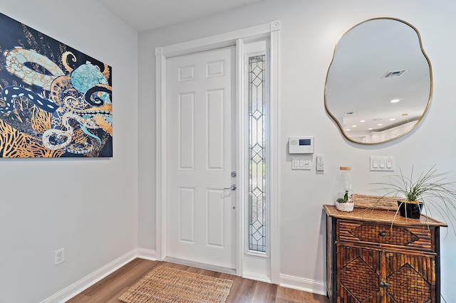 1310 S Jeaga Dr, Jupiter, FL 33458 - entryway with wood finished floors and baseboards
