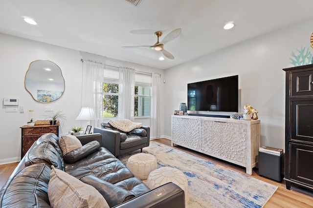 1310 S Jeaga Dr, Jupiter, FL 33458 - living area featuring a ceiling fan, light wood-style flooring, recessed lighting, and baseboards