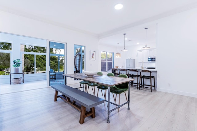 2068 Wightman Dr, Wellington, FL 33414 - dining area with light wood finished floors, recessed lighting, and baseboards