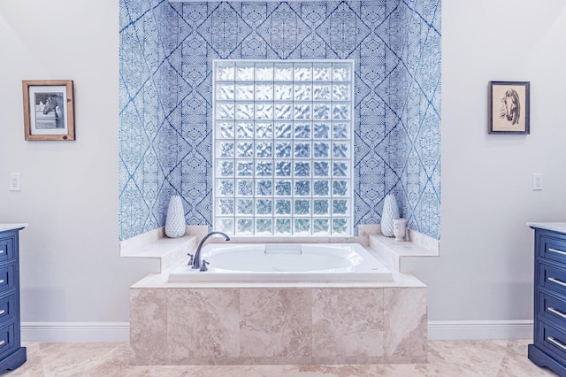 2068 Wightman Dr, Wellington, FL 33414 - bathroom with vanity, baseboards, a garden tub, and tile patterned flooring