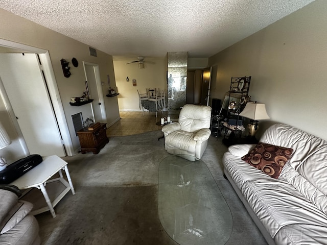 659 W Oakland Park Blvd Unit 206C, Oakland Park, FL 33311 - living area featuring a textured ceiling and a ceiling fan