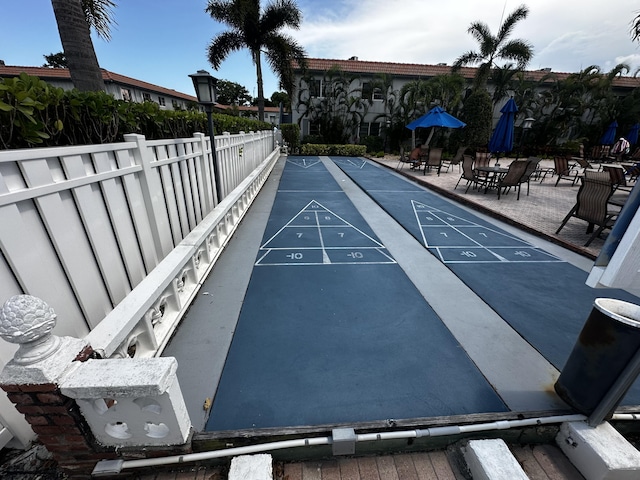 659 W Oakland Park Blvd Unit 206C, Oakland Park, FL 33311 - view of home's community featuring shuffleboard