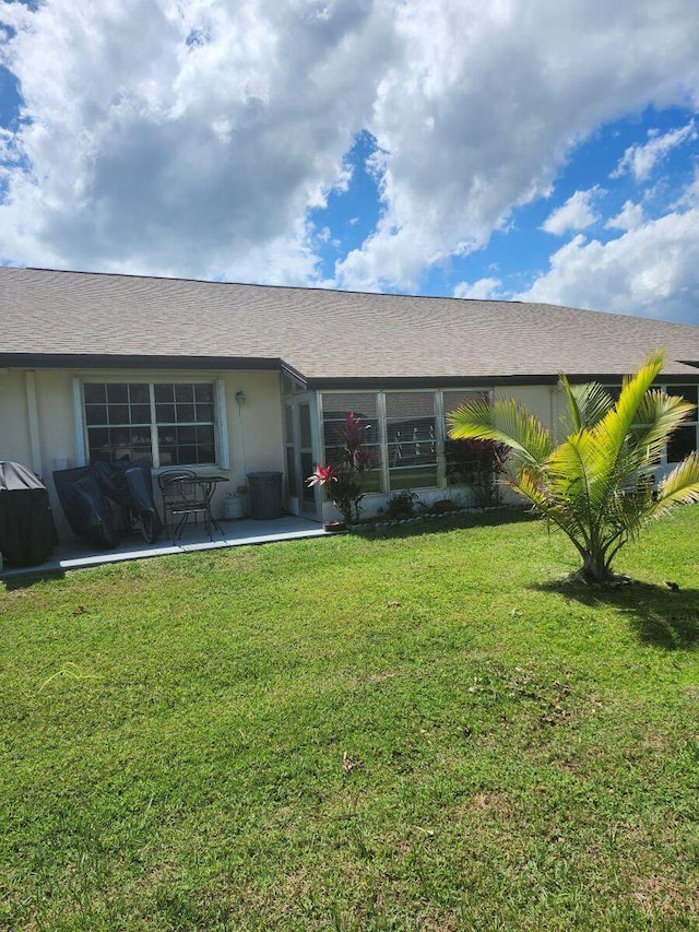 5794 Moss Ct Unit 7, Fort Pierce, FL 34982 - ranch-style house featuring a front yard and a patio area