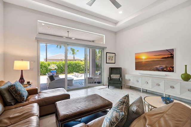 living room featuring ceiling fan and recessed lighting
