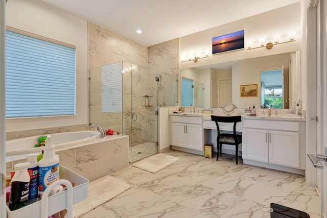 full bathroom with a stall shower, a garden tub, marble look tile flooring, vanity, and recessed lighting