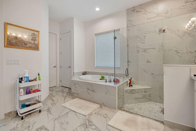 bathroom featuring a stall shower, a bath, marble finish flooring, and recessed lighting