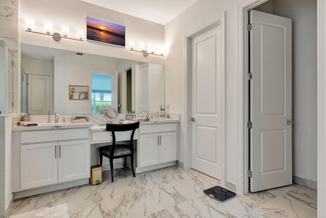 full bath with marble finish floors and vanity