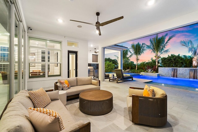 20049 SE Bridgewater Dr, Jupiter, FL 33458 - patio terrace at dusk with an outdoor living space, a patio area, ceiling fan, and an outdoor pool