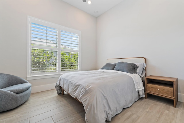 20049 SE Bridgewater Dr, Jupiter, FL 33458 - bedroom with light wood-style flooring and baseboards
