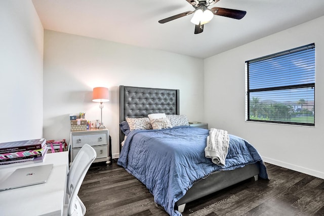 bedroom with wood finished floors, baseboards, and ceiling fan