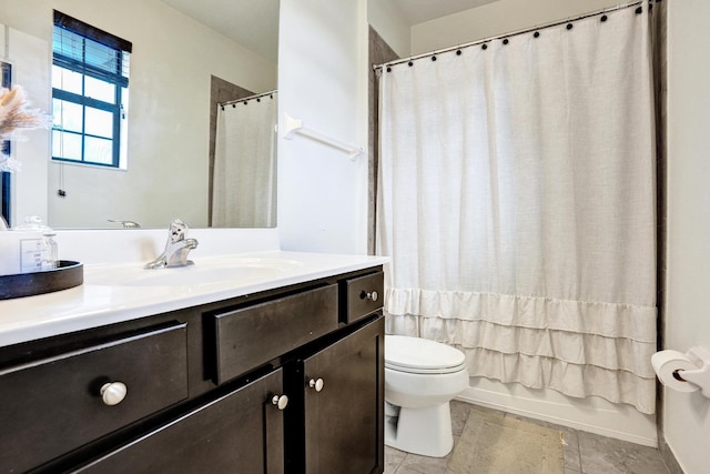 full bathroom featuring toilet, vanity, tile patterned flooring, and shower / bathtub combination with curtain