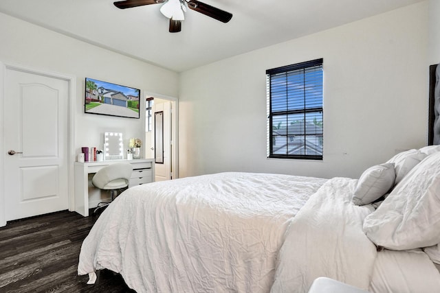 bedroom with dark wood-style flooring and ceiling fan
