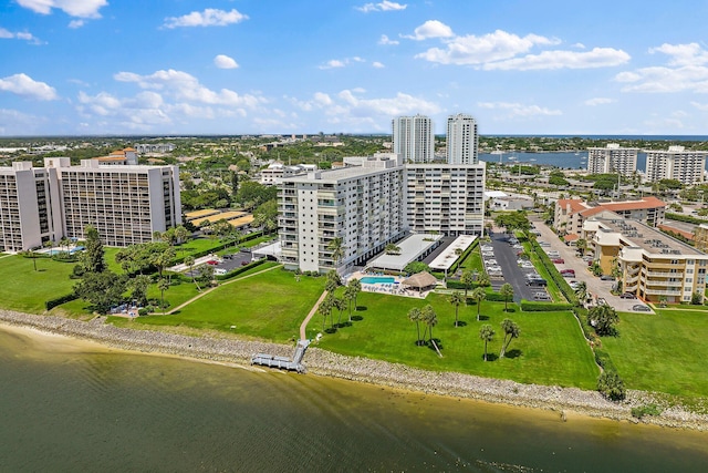 view of urban area featuring a nearby body of water