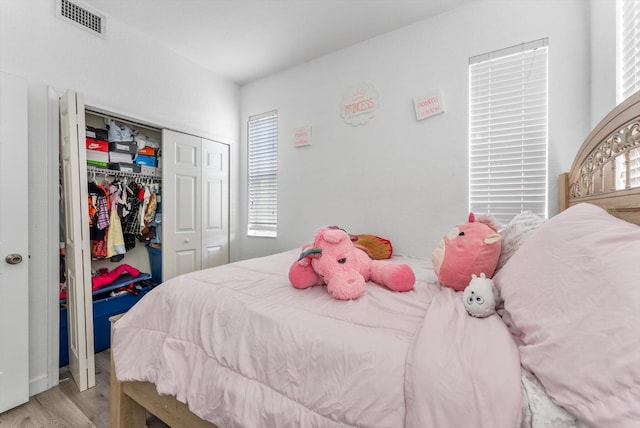 3518 Shoma Dr, Royal Palm Beach, FL 33414 - bedroom with wood finished floors and a closet